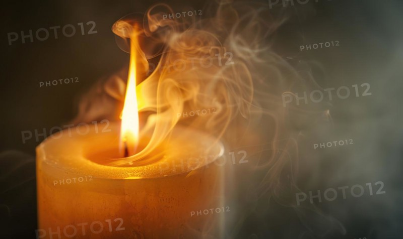 Close-up of a candle with wisps of smoke rising from the flame AI generated