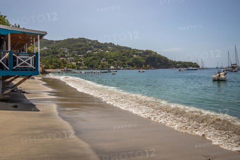 A beach in the Caribbean on the Atlantic coast in Deshaies, Guadeloupe, French Antilles, North America
