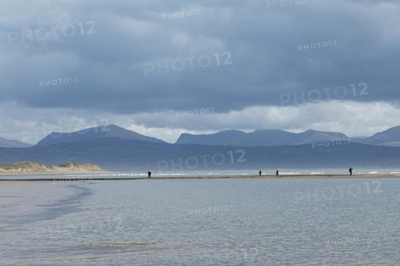 Beach, people, clouds, mountains, LLanddwyn Bay, Newborough, Isle of Anglesey, Wales, Great Britain