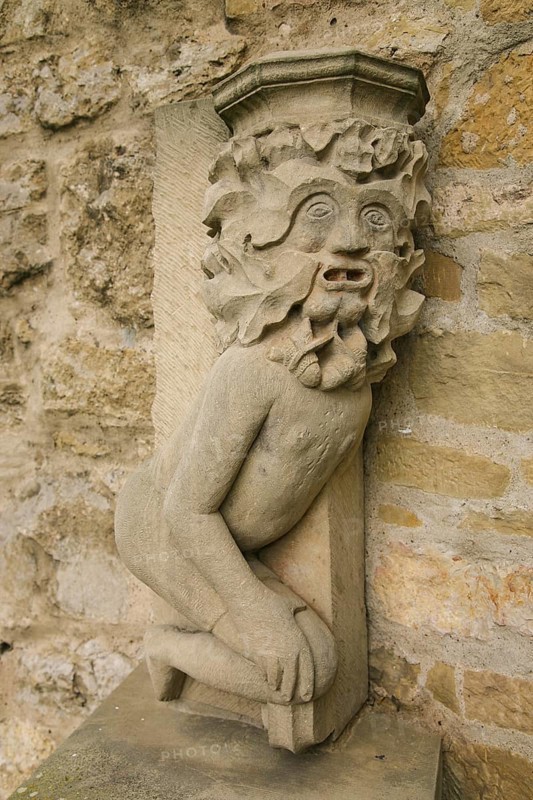 Detail at the moated castle Sachsenheim, castle Grosssachsenheim, former moated castle, architecture, historical building from the 15th century, stone figure, relief, portrait of the castle ghost, legendary figure with the name Klopferle, Sachsenheim, district Ludwigsburg, Baden-Wuerttemberg, Germany, Europe