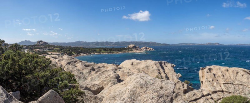 Typical granite rock formations in front of a bay, Baja Sardinia, Costa Smeralda, Sardinia, Italy, Europe