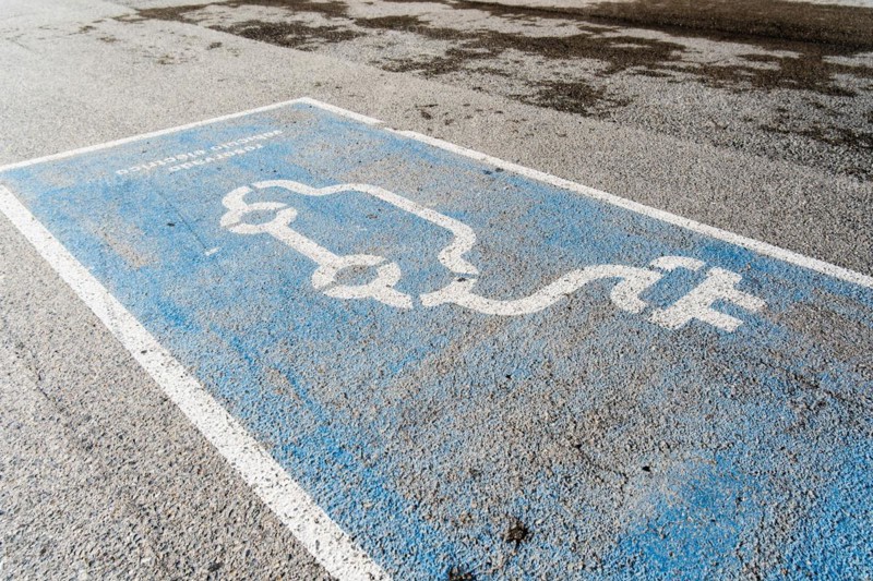 Parking space for an electric car on the beach in Barcelona, Spain, Europe