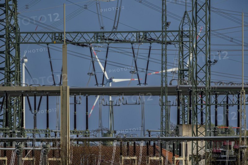 Stendal West substation with wind turbines in the background near Luederitz, Stendal, Saxony-Anhalt, Germany, Europe