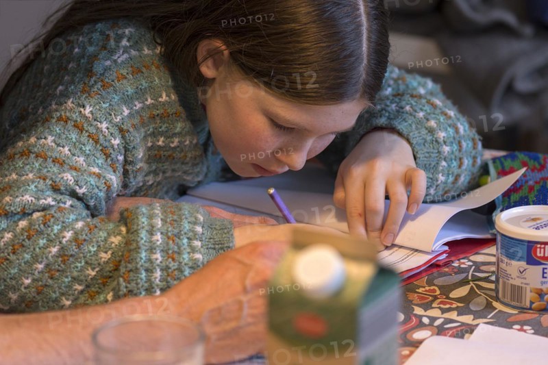 Girl, 10 years old, doing schoolwork, Mecklenburg-Western Pomerania, Germany, Europe