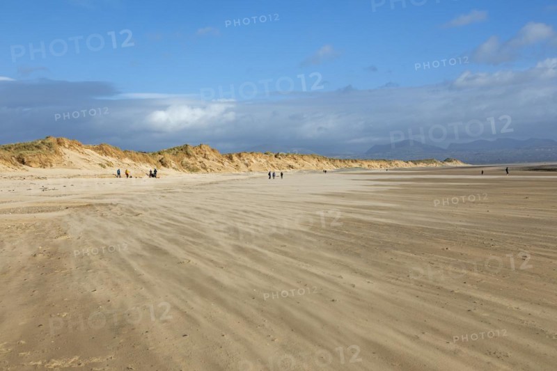 Sand blowing over beach, clouds, LLanddwyn Bay, Newborough, Isle of Anglesey, Wales, Great Britain