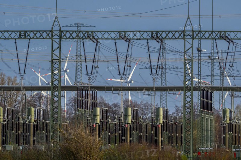 Stendal West substation with wind turbines in the background near Luederitz, Stendal, Saxony-Anhalt, Germany, Europe