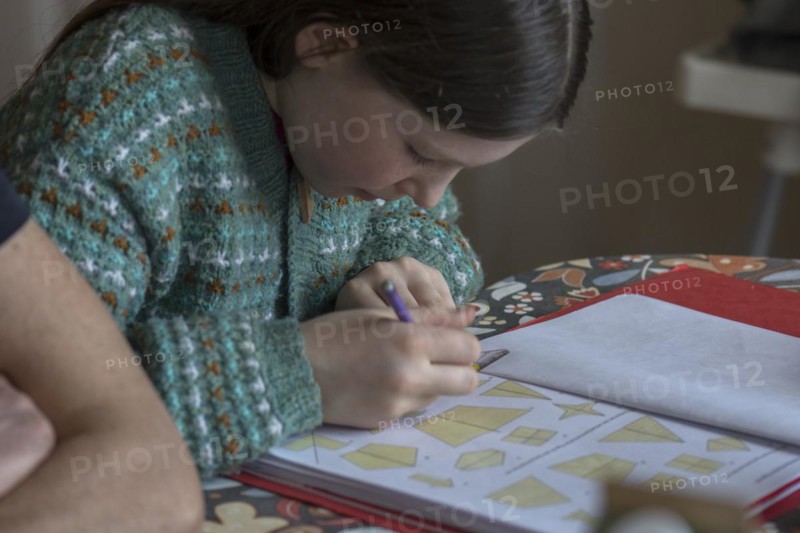 Girl, 10 years old, doing schoolwork, Mecklenburg-Western Pomerania, Germany, Europe