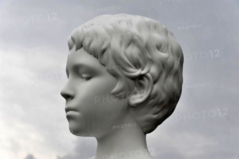 Charles Ray's statue of the boy with frog on top of the Zattere Portrait of a classical bust of a boy in white marble with detailed strands of hair, Venice, Veneto, Italy, Europe
