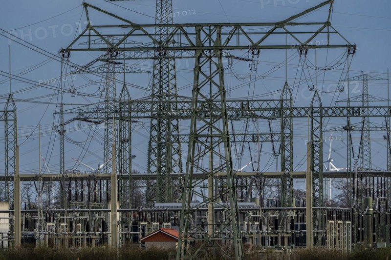 Stendal West substation with wind turbines in the background near Luederitz, Stendal, Saxony-Anhalt, Germany, Europe