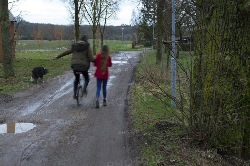 Girl riding a unicycle, motion blur, Mecklenburg-Vorpommern, Germany, Europe