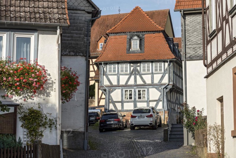 Old schoolhouse, half-timbered house with mansard roof, cultural monument, listed building, old town, Ortenberg, Vogelsberg, Wetterau, Hesse, Germany, Europe