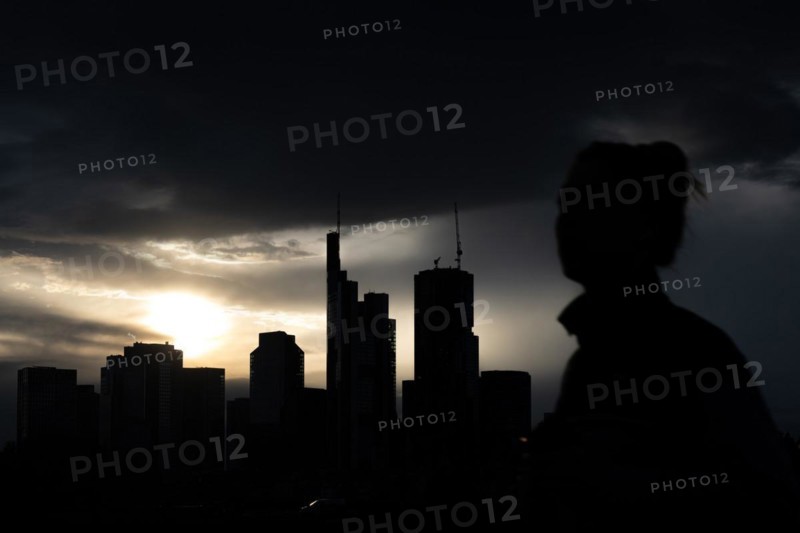 Dense clouds pass over the Frankfurt banking skyline in the evening, Floesserbruecke, Frankfurt am Main, Hesse, Germany, Europe