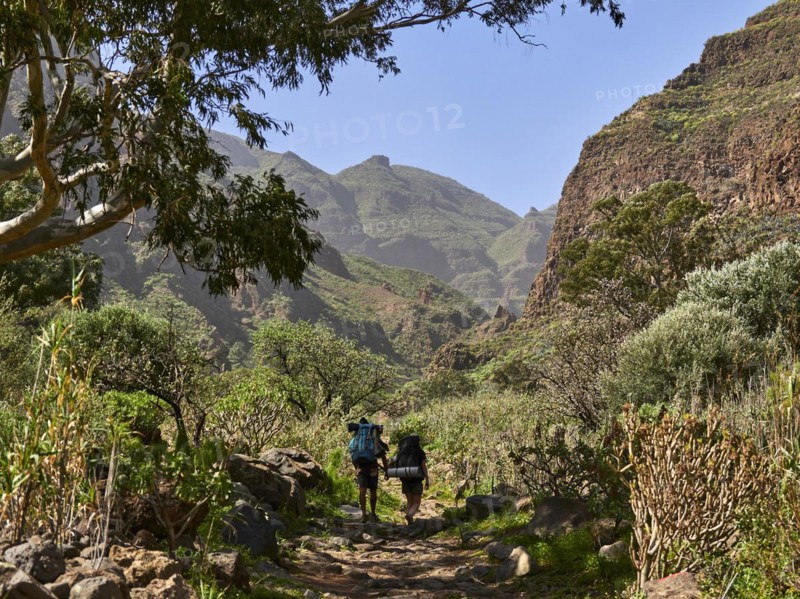 Hikers in the Barranco de Guayadeque, Gran Canaria, Spain, Europe