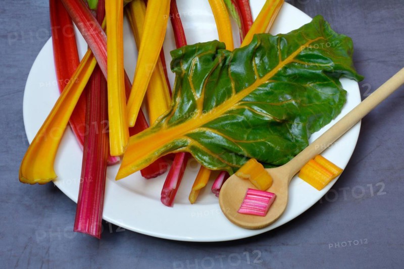 Red and yellow chard on a plate, Beta vulgaris