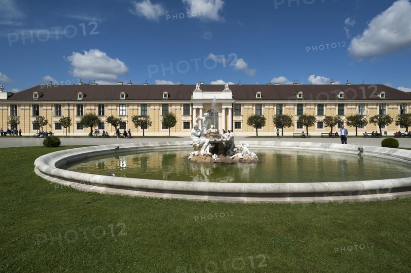 Right side building with fountain of Schoenbrunn Palace, Vienna, Austria, Europe