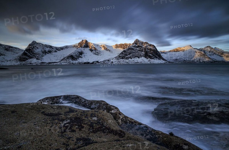Rocky coast off Bergen, sea, waves, spray, morning mood with clouds, long exposure, winter, Tungeneset, Senja, Troms, Norway, Europe