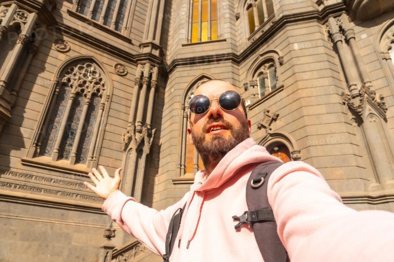 Selfie of a tourist visiting the Church of San Juan Bautista, Arucas Cathedral, Gran Canaria, Spain, Europe