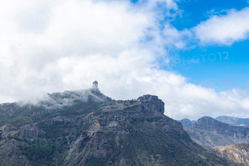 Beautiful landscape of Roque Nublo with fog from a viewpoint. Gran Canaria, Spain, Europe