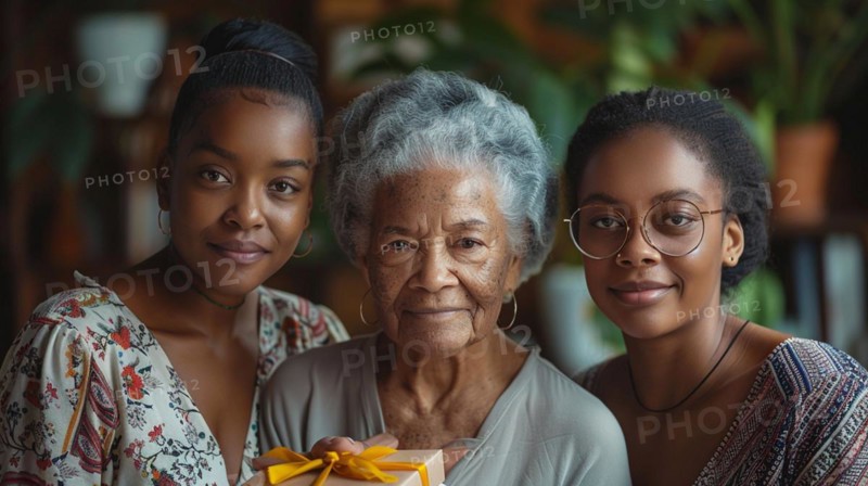 A heartfelt moment between an elderly woman and two young women with a gift, AI generated