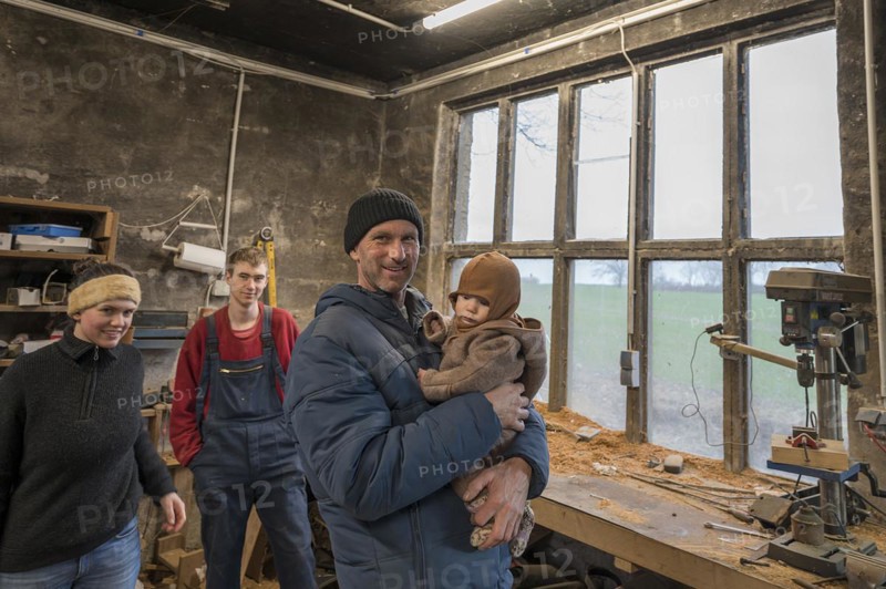 Family reunion in the workshop, father, daughter, son and grandson, Mecklenburg-Vorpommern, Germany, Europe