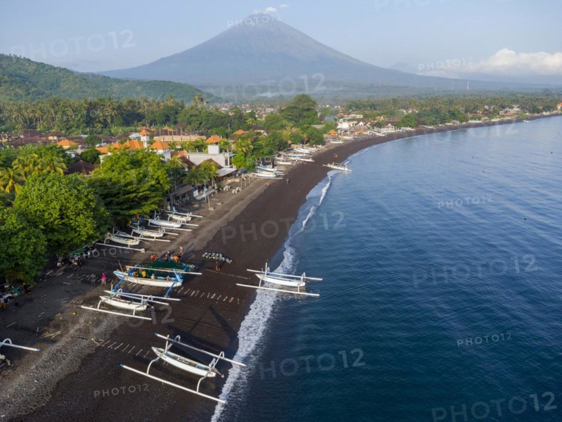 Fishermen coming back from fishing in the morning, in the background Mount Agung, Amed, Karangasem, Bali, Indonesia, Asia