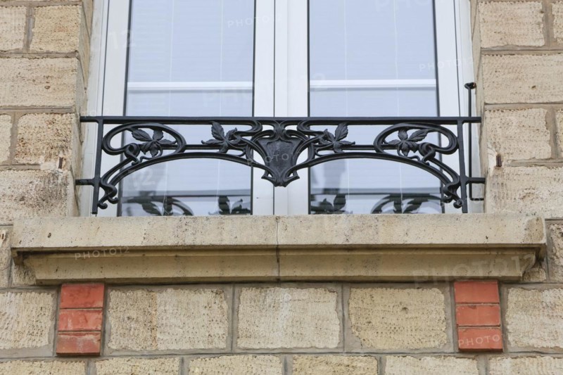 Window railings and balconies on residential buildings designed by Hector Guimard in the Art Nouveau style and produced in the municipal metal foundry Fonderies de Saint-Dizier, Saint-Dizier, Haute-Marne department, Grand Est region, France, Europe