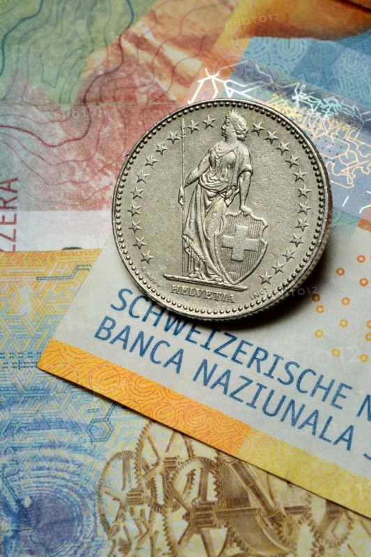 Swiss coin on banknotes, Swiss franc, Switzerland, Europe