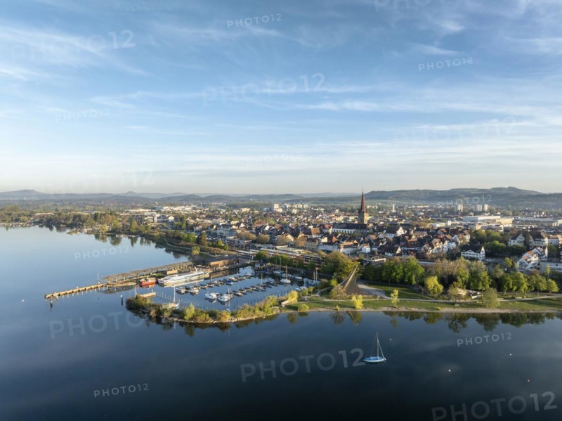 Aerial view of the town of Radolfzell on Lake Constance in spring-like vegetation with the Waeschbruck harbour, harbour pier and concert sail, district of Constance, Baden-Wuerttemberg, Germany, Europe