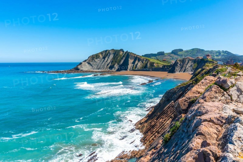 View of Itzurun beach from Cala de Algorri in the Flysch Basque Coast geopark in Zumaia, Gipuzkoa