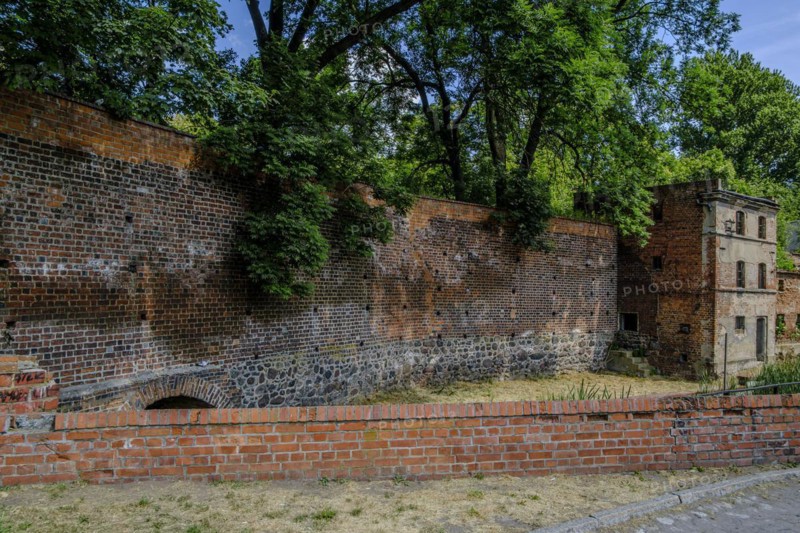 Abandoned, dilapidated building, integrated into the old historic town wall of Namyslow (Namslau), Opole Voivodeship, Poland, Europe