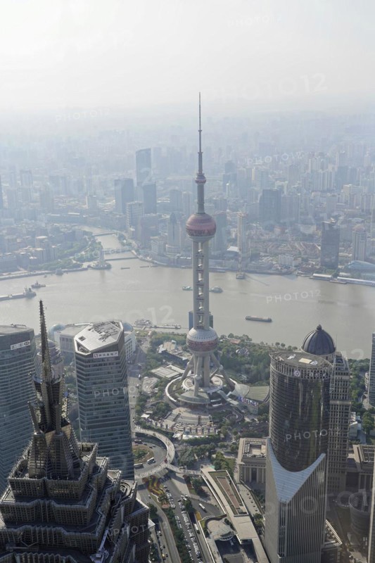 View from the 632 metre high Shanghai Tower, nicknamed The Twist, Shanghai, People's Republic of China, view from above of a city with a river, surrounded by tall buildings, Shanghai, China, Asia