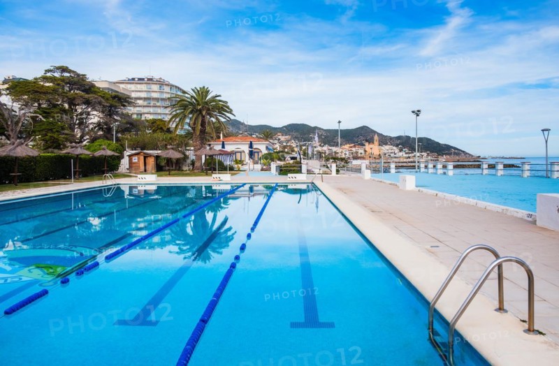 Swimming pool on the beach in Sitges, Spain, Europe