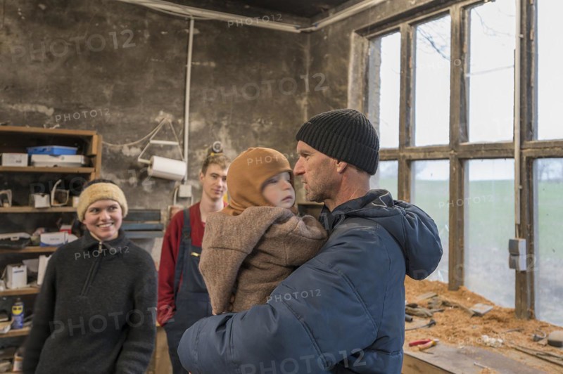 Family reunion in the workshop, father, daughter, son and grandson, Mecklenburg-Vorpommern, Germany, Europe