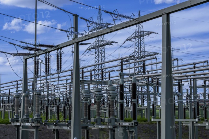 Power pylons with high-voltage lines and insulators at the Avacon substation in Helmstedt, Helmstedt, Lower Saxony, Germany, Europe