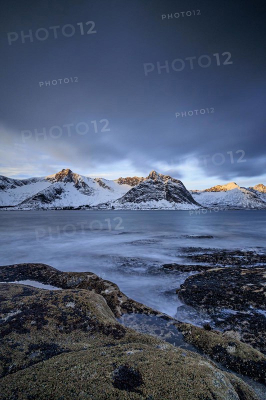 Rocky coast off Bergen, sea, waves, spray, morning mood with clouds, long exposure, winter, Tungeneset, Senja, Troms, Norway, Europe