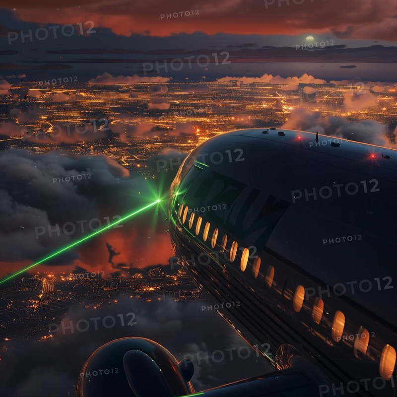 Flight over an illuminated city with green laser beams and clouds at night, laser attack on an airliner, AI generated