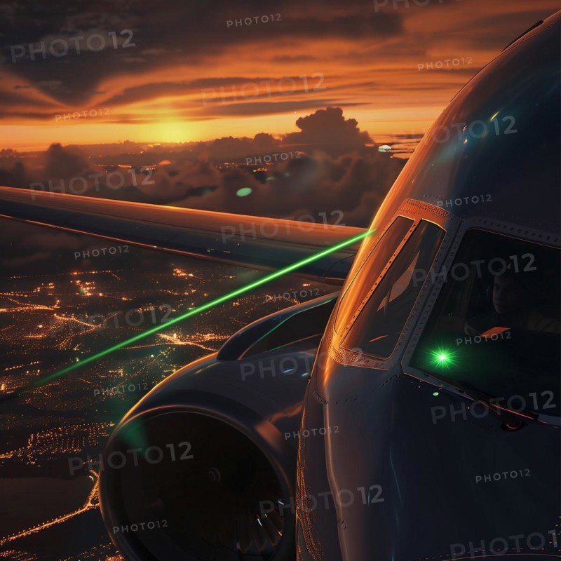 Pilot in the cockpit of an aeroplane flying over a city with green lasers at night, laser attack on an airliner, AI generated