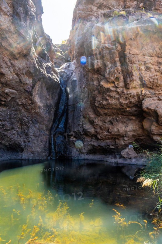 Beautiful waterfall at Charco Azul in El Podemos a Agaete on Gran Canaria, Canary Islands