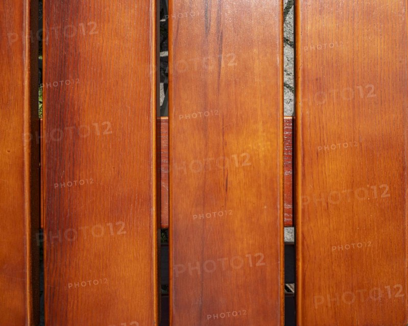 Wooden slats, seat of a traditional wooden folding chair in detail, background