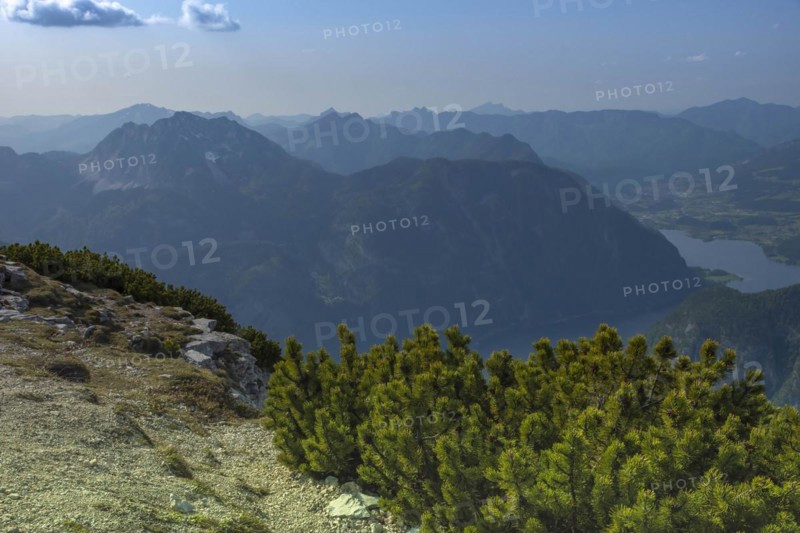 Amazing mountains panorama from 5 Fingers viewing platform in the shape of a hand with five fingers on Mount Krippenstein in the Dachstein Mountains of Upper Austria, Salzkammergut region, Austria, Europe