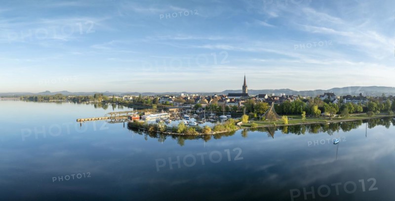 Aerial view, panorama of the town of Radolfzell on Lake Constance in springtime vegetation with the Waeschbruckhafen harbour, harbour pier and concert sail, district of Constance, Baden-Wuerttemberg, Germany, Europe