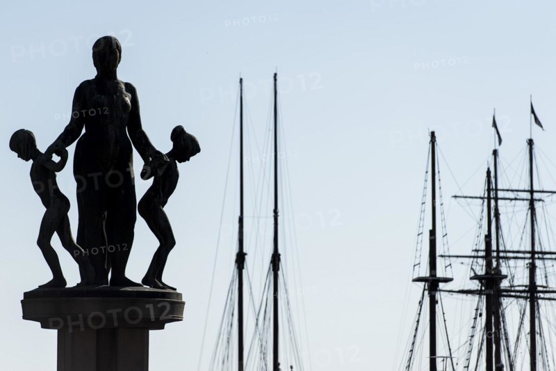 Sculptures by Gustav Vigeland and ship masts, City Hall forecourt, Oslo, Norway, Europe