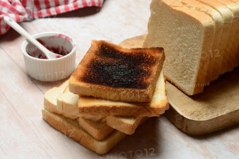 Burnt slice of toast with toast, toast