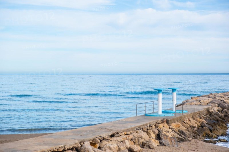 Showers on the beach in Sitges, Spain, Europe