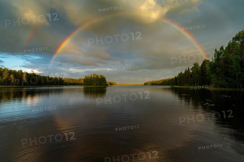 Double rainbow over lake near Hartola, forest, evening mood, Finland, Europe