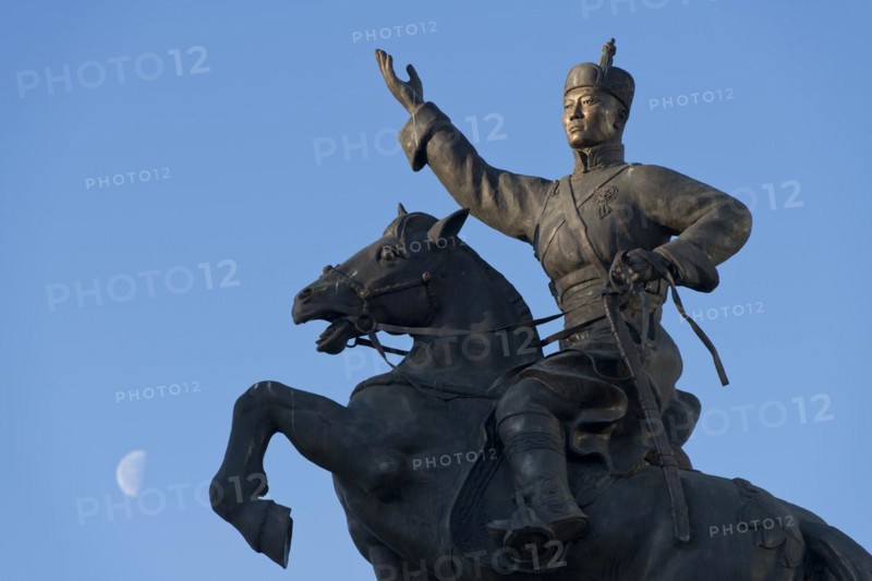 Crescent moon behind statue of Damdin Suekhbaatar on Genghis Khan Square or Suekhbaatar Square in the capital Ulaanbaatar, Ulan Bator, Mongolia, Asia