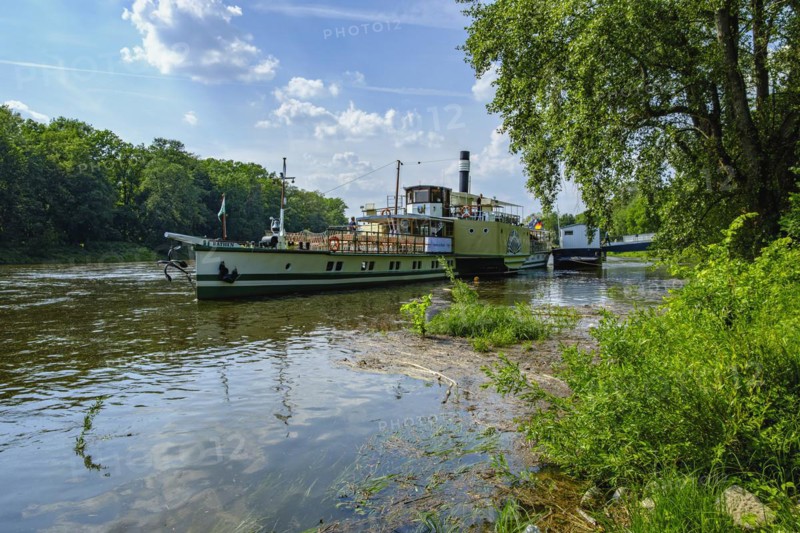 The historic paddle steamer KURORT RATHEN has docked at the steamer landing stage in Pillnitz, Dresden, Saxony, Germany, Europe