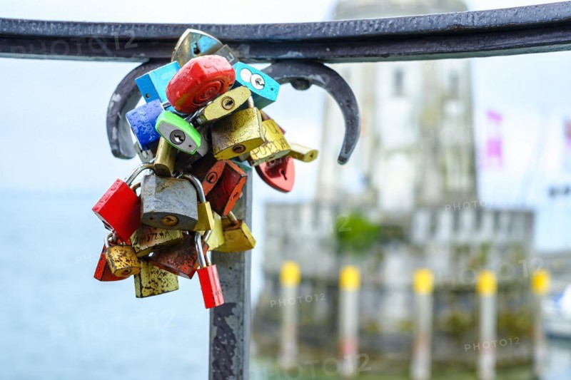Symbolic image: Love locks on a railing, here in the harbour in the old town of Lindau (Lake Constance), Bavaria, Germany, Europe
