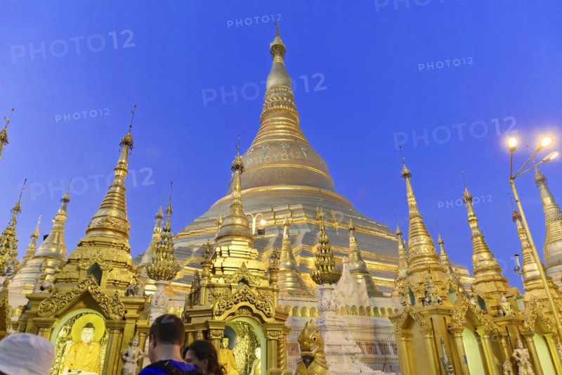 Shwedagon Pagoda, Yangon, Myanmar, Asia, The Shwedagon Pagoda at night, illuminated by floodlights and visited by worshippers, Asia