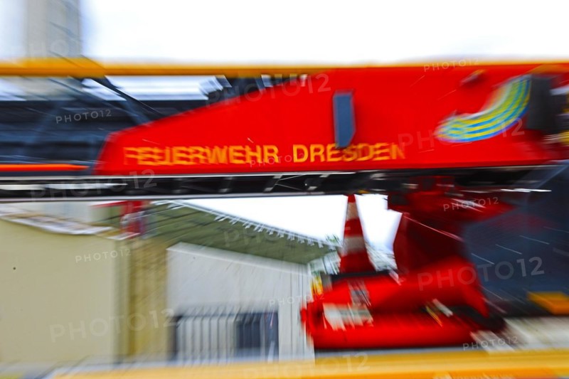 Motion blur shows the fast action of a fire brigade turntable ladder